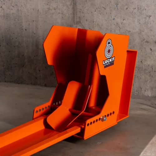 Orange DockIT motorcycle stand photographed on its own