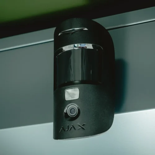 AJAX alarm sensor inside MotoDome AJAX security alarm sensor mounted inside a MotoDome motorcycle garage