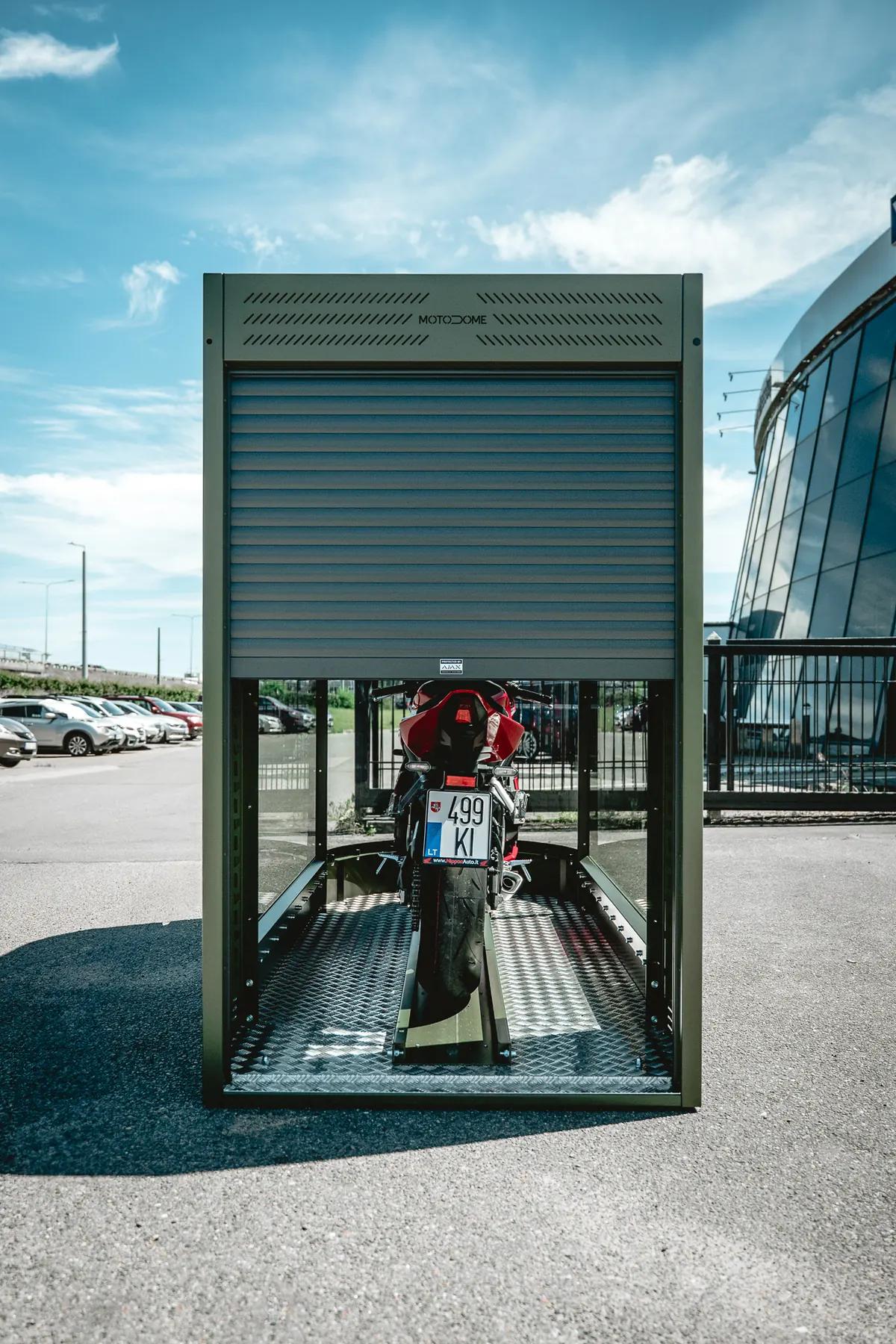 MotoDome motorcycle garage photographed head on in daylight