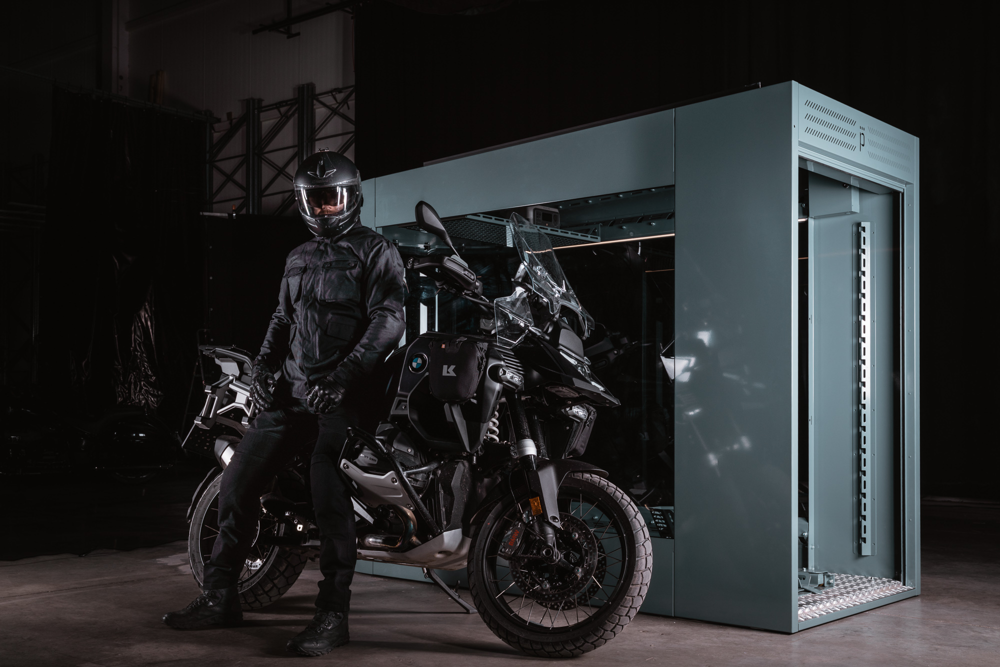 MotoDome motorcycle garage with motorcyclist